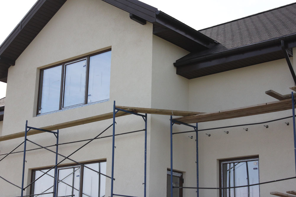 Мокрый фасад на доме из газобетона